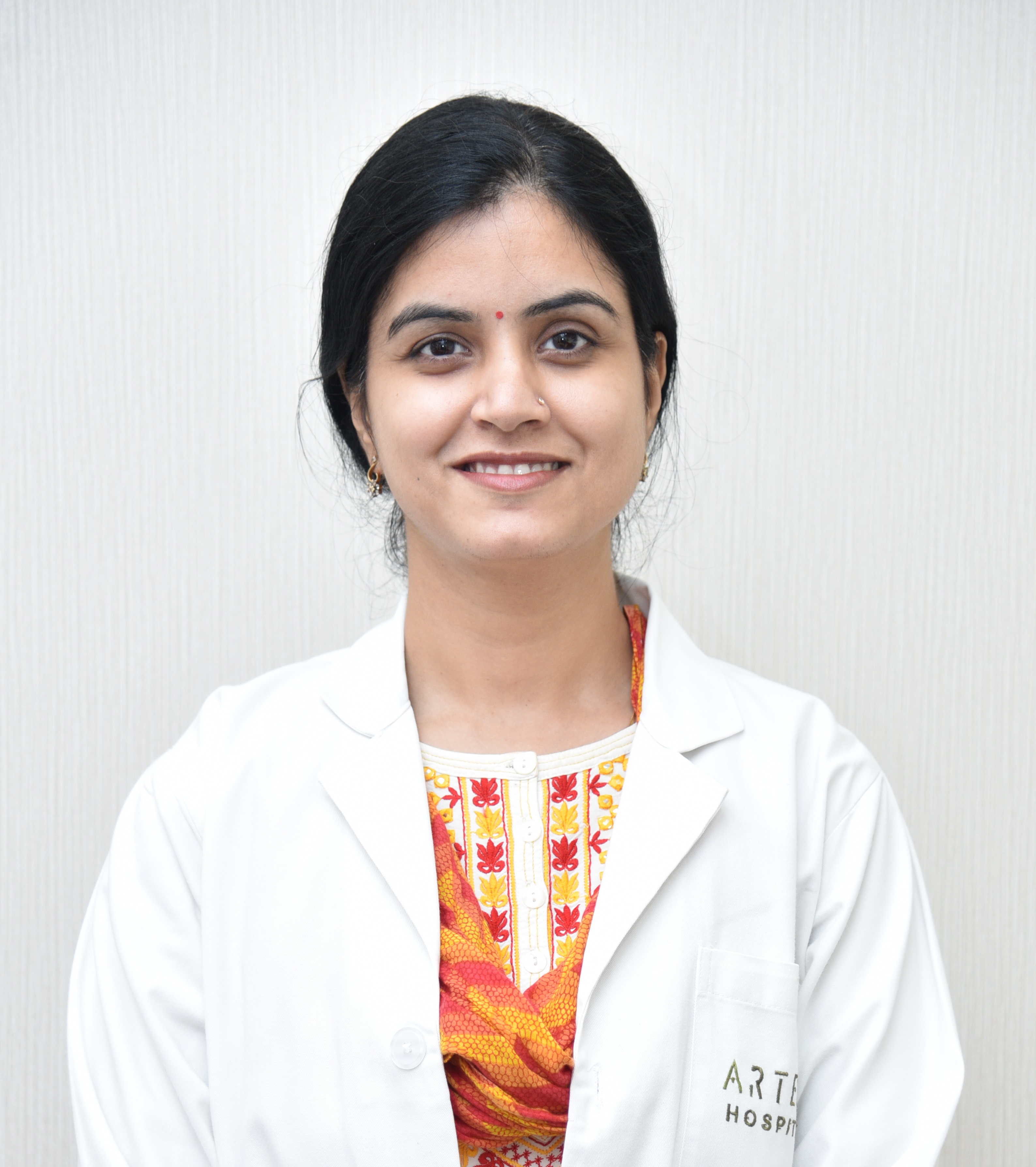 Dr. Parvinder Kaur Arora